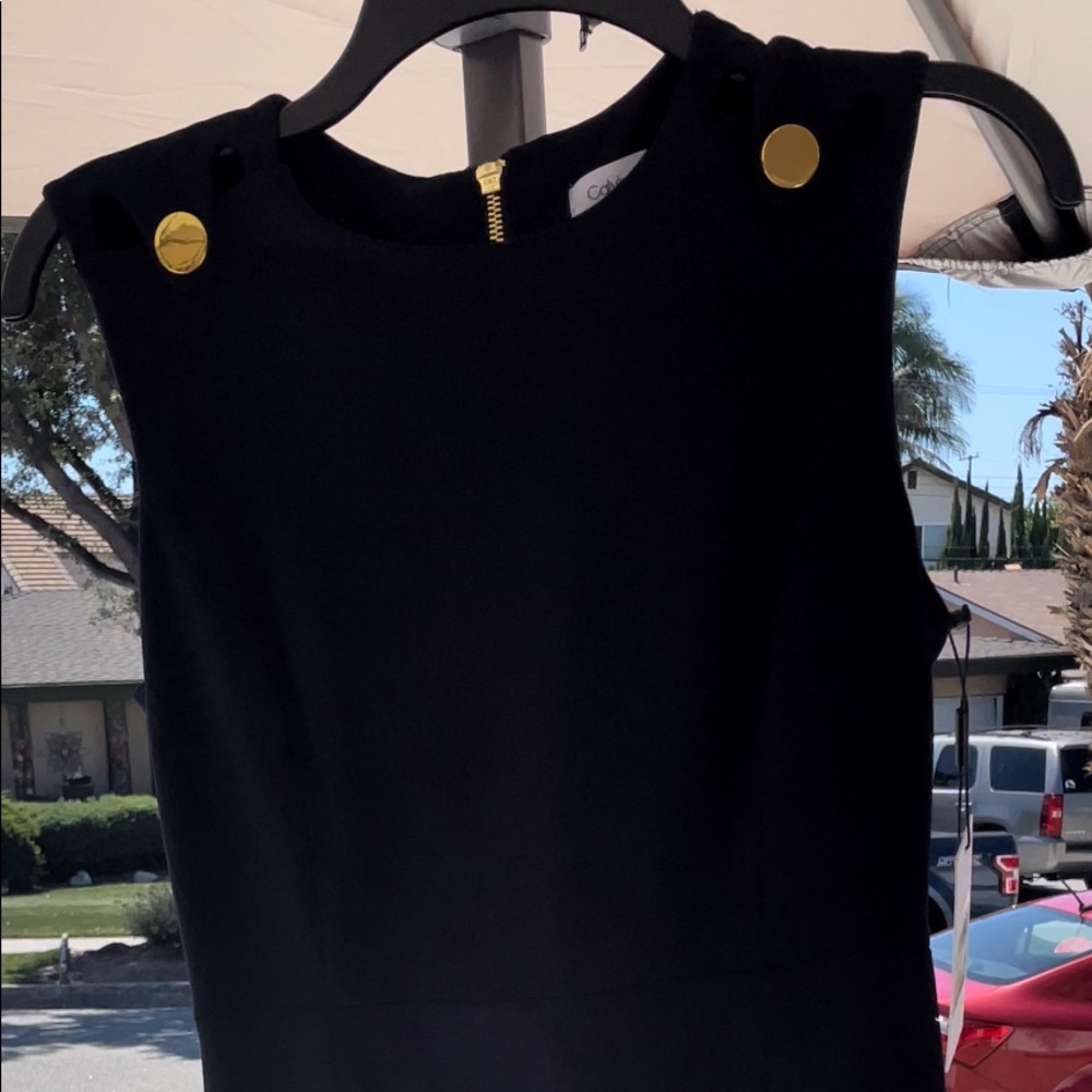 Calvin Klein midi dress. Navy Blue with Gold Detail buttons. 36” in long.